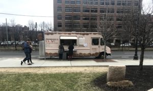 Zinneken’s waffle truck parked on Com ave on an April afternoon. 