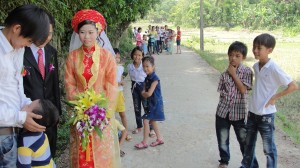 The locals, especially children, love to see a wedding procession and some follow it all the way to the end.
