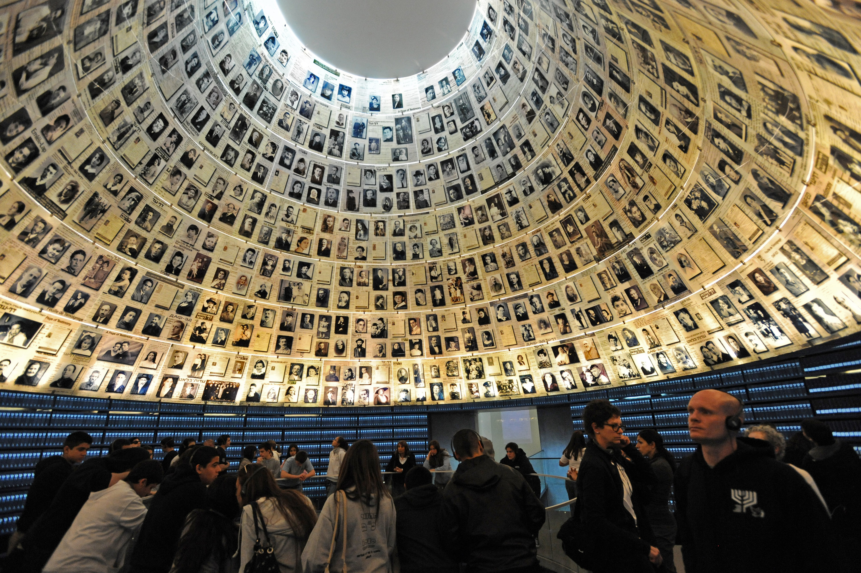 Tourists visit the Hall of Names in the Yad Vashem Holocaust Museum in