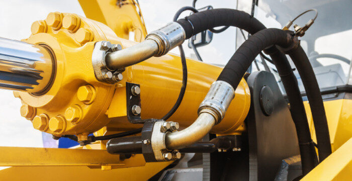 What are the most common causes of hydraulic system failure