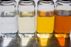 What does Milky hydraulic fluid mean