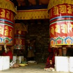 prayer wheels near the temple.  women sit there all day and pray.