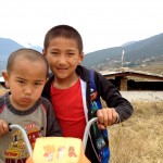 kids near the fertility temple, chimi lhakhang