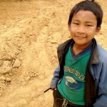 punakha.  i gave him a dollar.  he couldn't stop smiling. 