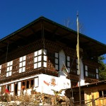 traditional bhutanese architecture.  note the fertility artwork.
